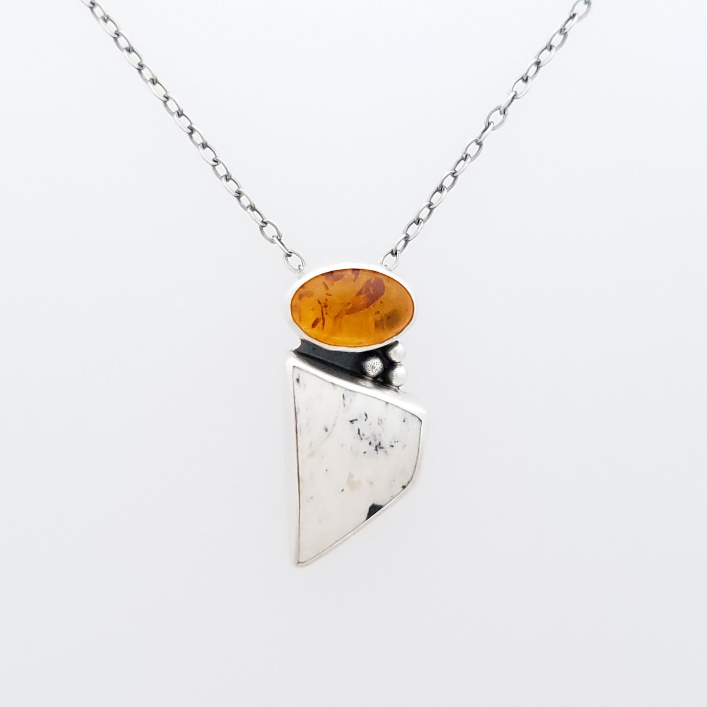 Amber and White Buffalo Turquoise pendant